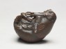 Netsuke in the form of a goat (bottom)