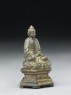 Seated Buddhist figure (side)