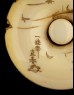 Manjū netsuke depicting Taira no Koremochi with a witch (detail)