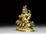 Figure of Vaishravana on a lion (side)