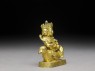 Figure of a bodhisattva seated on a bird (side)