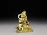 Figure of a bodhisattva seated on an elephant (side)