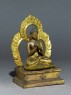 Seated figure of the Buddha with a mandala (side)