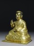 Seated figure of Tashi Lama (side)