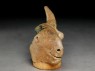 Terracotta head of an animal, possibly a bull (oblique)