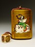 Inrō depicting the bodhisattva Fugen Bosatsu, and attached to a netsuke and ojime (back)