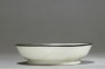 White ware bowl with dragons, flowers, and clouds (side)