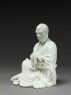 Seated figure of the Buddhist disciple Lohan (side)