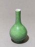 Tall-necked vase with green glaze (oblique)