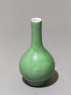 Tall-necked vase with green glaze (oblique)