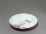Dish with a bird on a branch (oblique)