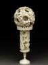 Ivory ball and stand with floral decoration (side)
