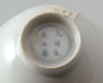 White ware bowl with two dragons and clouds (oblique)