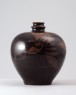 Black ware vase with two birds (oblique)