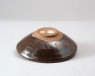 Black ware bowl with 'oil spot' glazes (oblique)