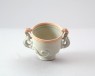 White ware cup with two dragons (oblique)