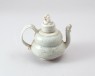 White ware ewer and lid with floral decoration (oblique)