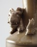 Greenware funerary vase with tiger, a puppy, and bird (oblique)