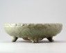 Greenware narcissus bowl with animal mask feet and begonia decoration (oblique)