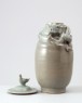 Greenware funerary jar with dragon and a bird (oblique)