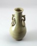 Greenware vase with handles in the form of dragons (oblique)