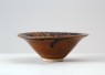 Black ware tea bowl with 'partridge feather' glazes (front)