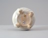White ware jar with four animal paws (oblique)