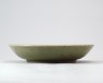 Greenware dish with lotus decoration (oblique)