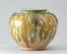 Jar with appliqué arabesque decoration under a three colour glaze (oblique)