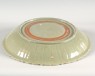 Greenware dish with foliated rim (oblique)