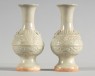 White ware vase with lotus decoration and taotie mask handles (oblique)