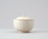 White ware bowl and lid with lotus petal decoration (oblique)