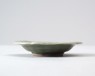 Greenware dish with floral decoration (oblique)